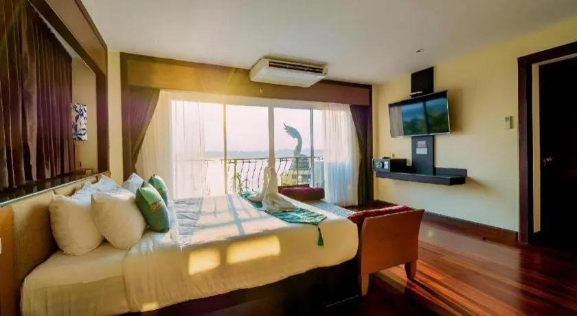 Bed in LANDMARK NAKHONPHANOM HOTEL