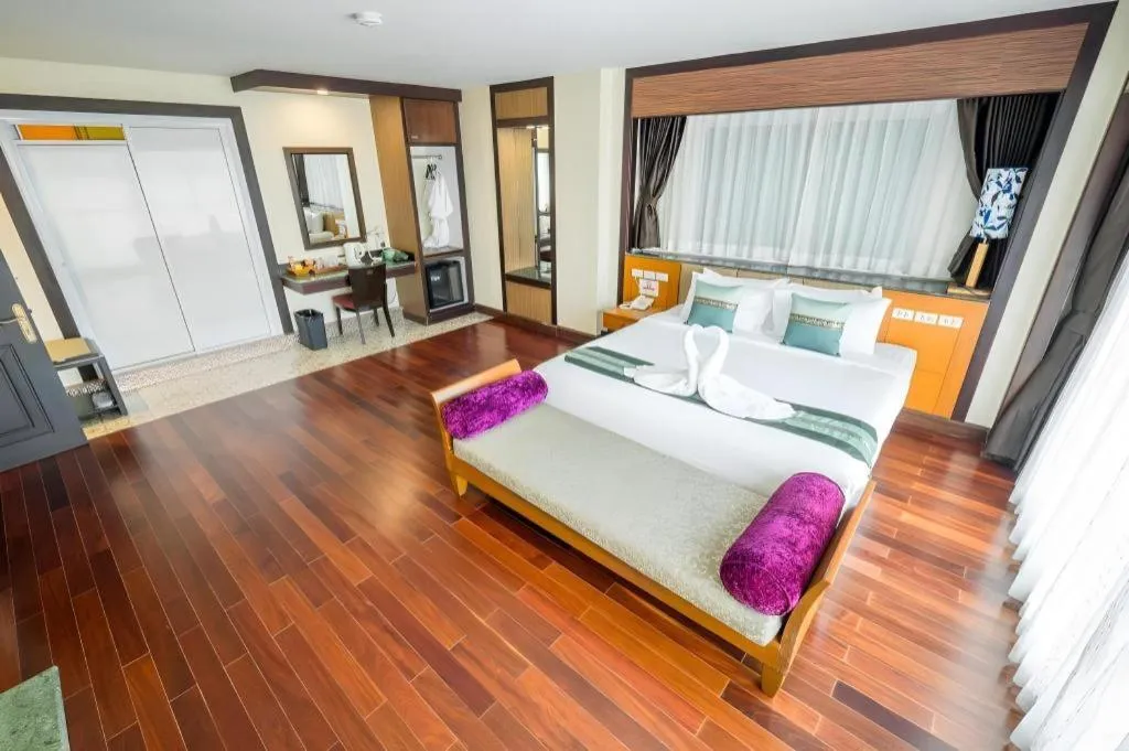 Bed in LANDMARK NAKHONPHANOM HOTEL