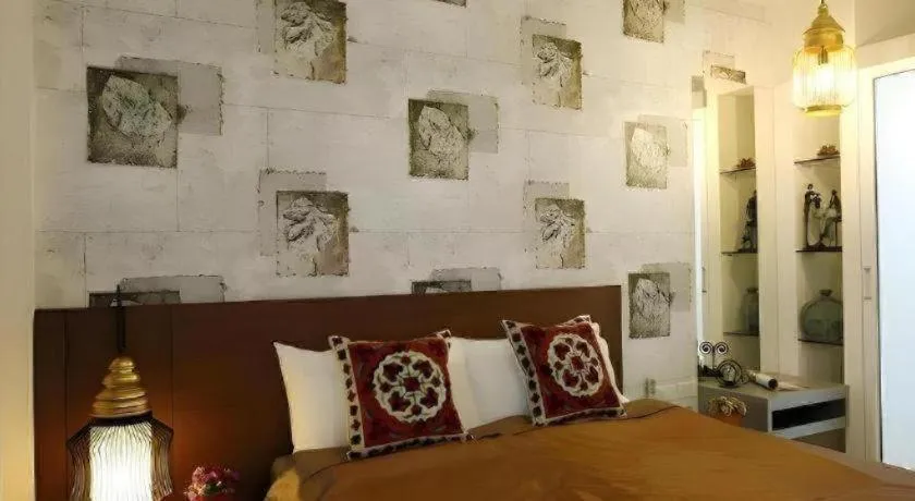 Bed in The Xym Hotel