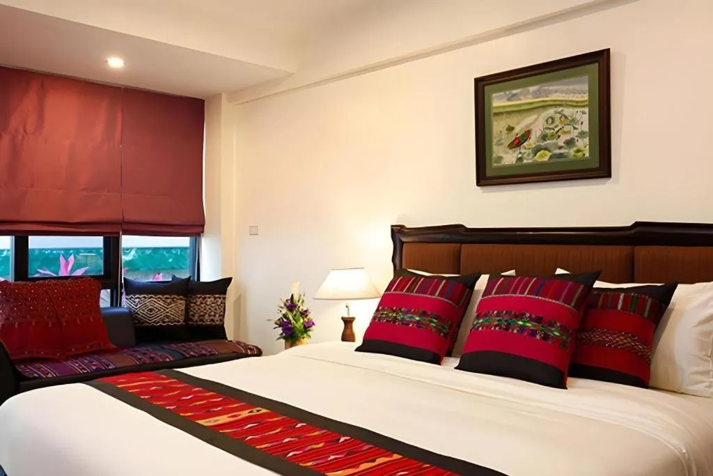 Bed in The Xym Hotel