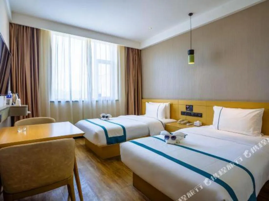 Bed in City Comfort Inn Chongqing Jiangbei Airport T3 Terminal