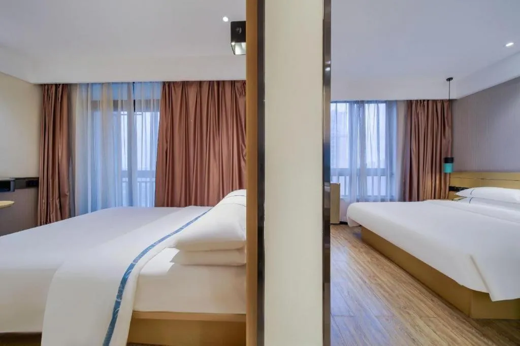 Bed in City Comfort Inn Chongqing Jiangbei Airport T3 Terminal