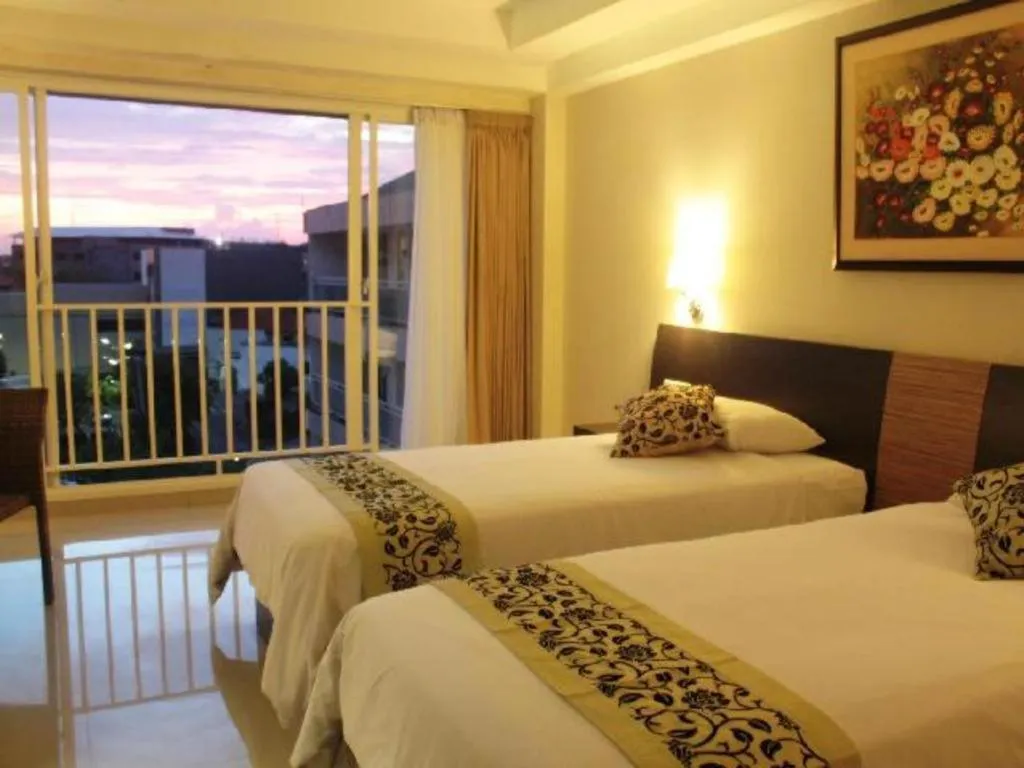 Bed in Losari Sunset Hotel