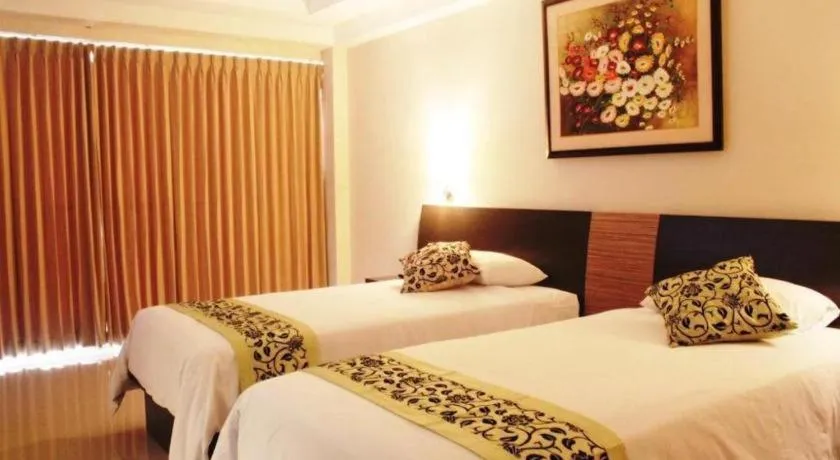 Bed in Losari Sunset Hotel