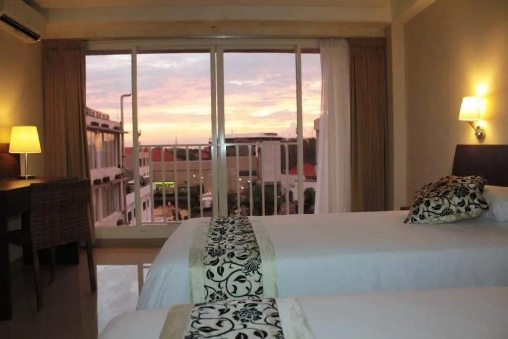 Bed in Losari Sunset Hotel