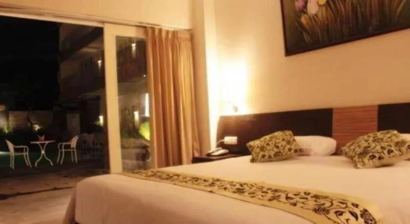 Bed in Losari Sunset Hotel