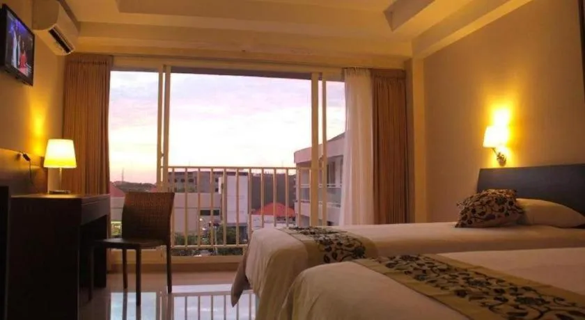 Bed in Losari Sunset Hotel