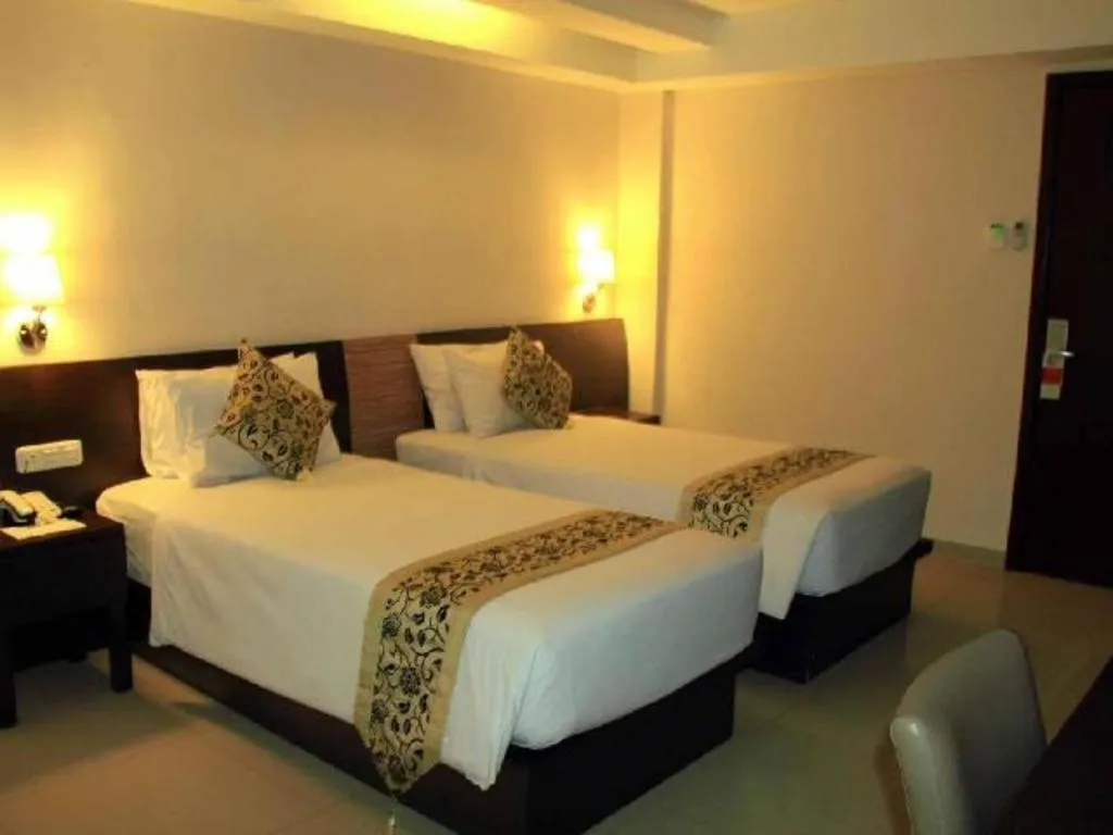Bed in Losari Sunset Hotel