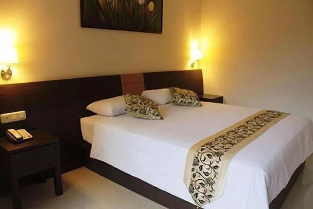 Bed in Losari Sunset Hotel