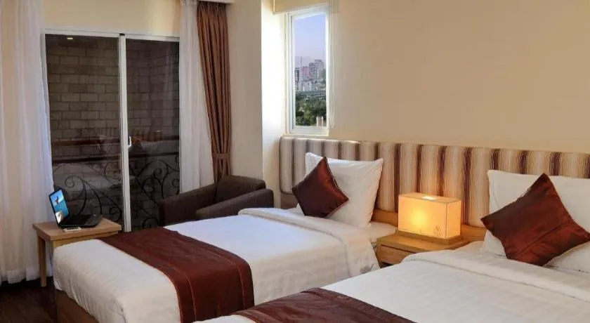 Bed in Begonia Nha Trang Hotel