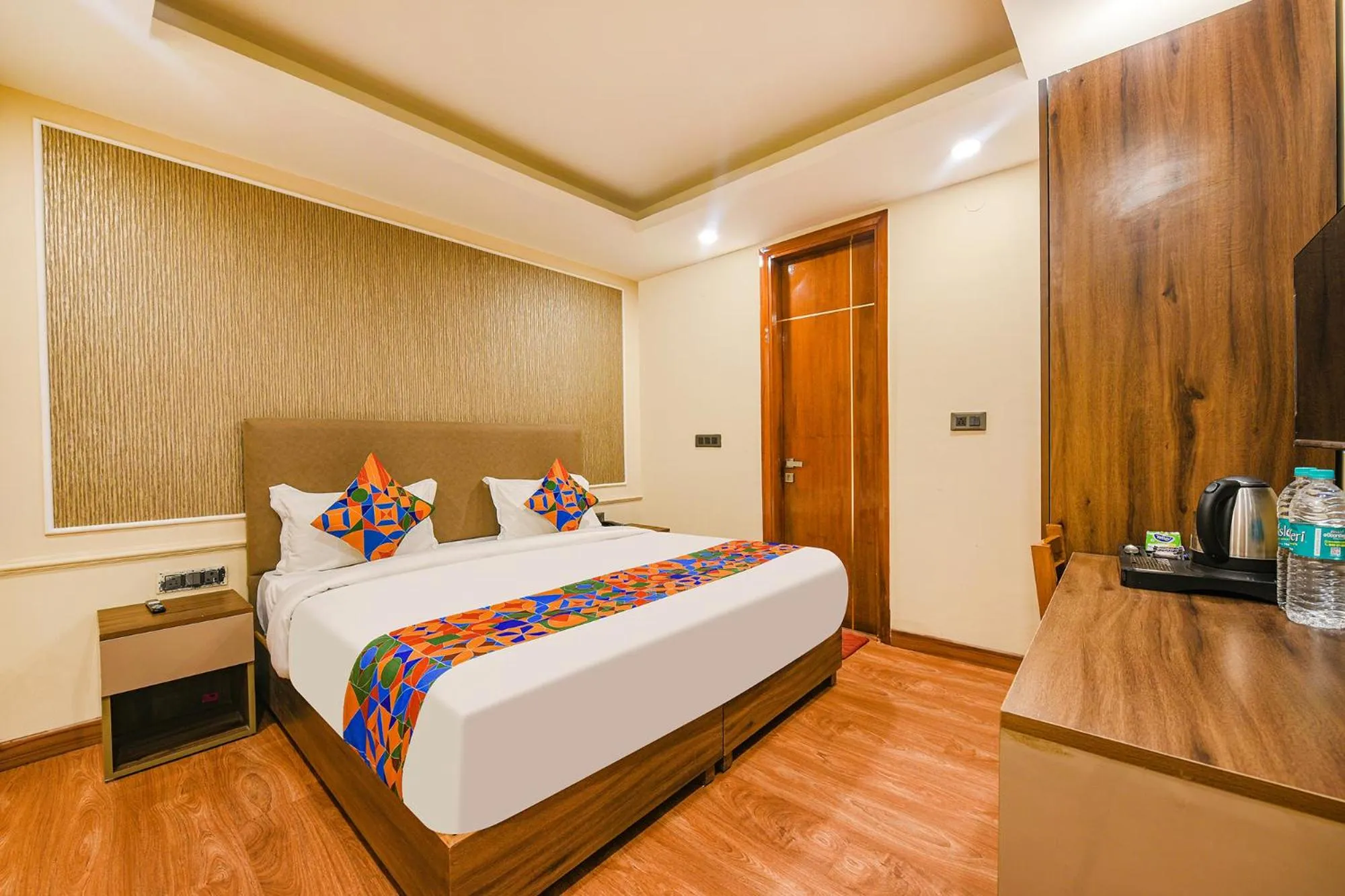 Bed in FabHotel Prime Blest Park Near Yashobhoomi Convention Centre