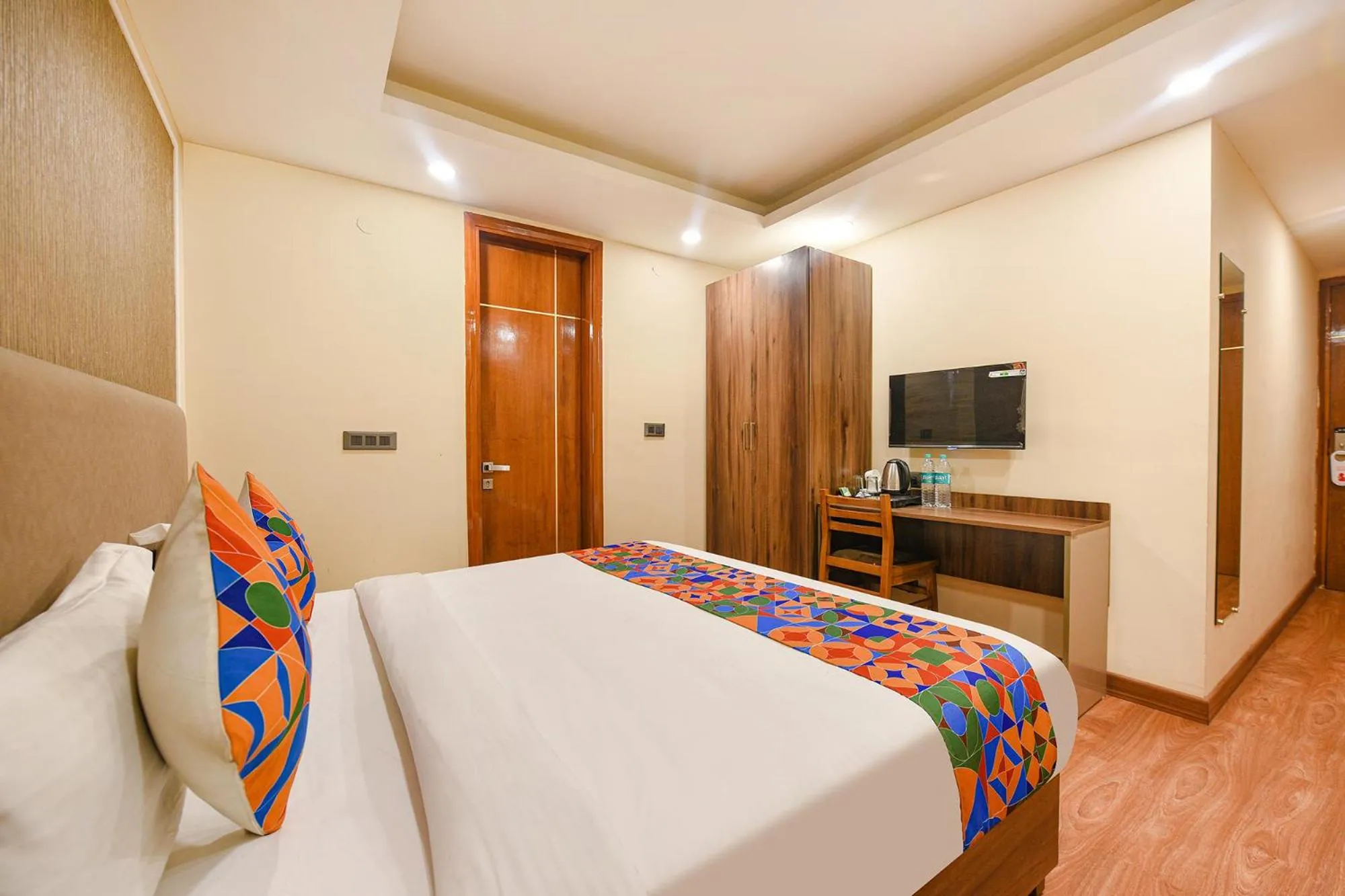Bed in FabHotel Prime Blest Park Near Yashobhoomi Convention Centre