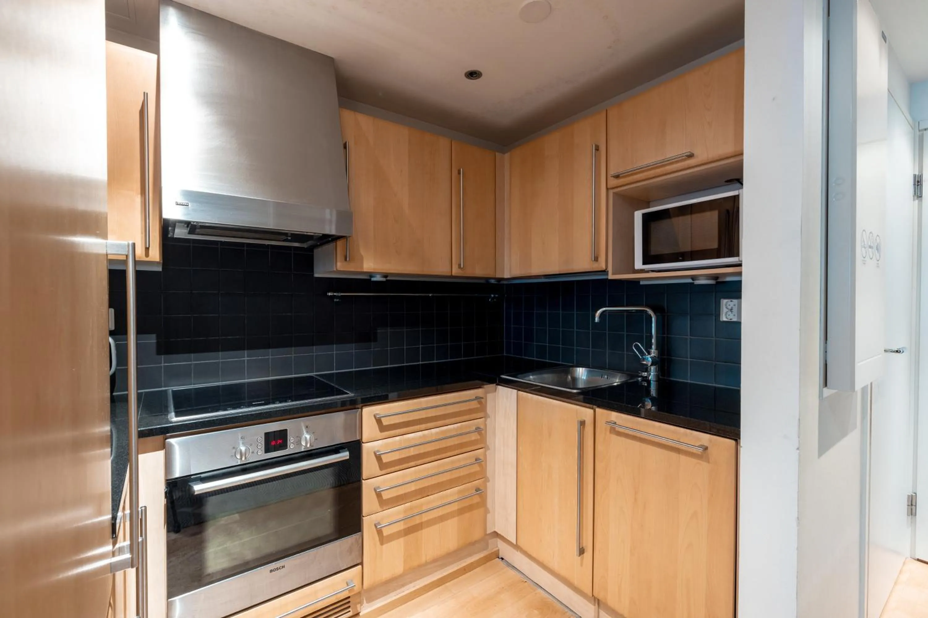 Kitchen or kitchenette in 2ndhomes Kamppi Center Apartment with Balcony & Sauna