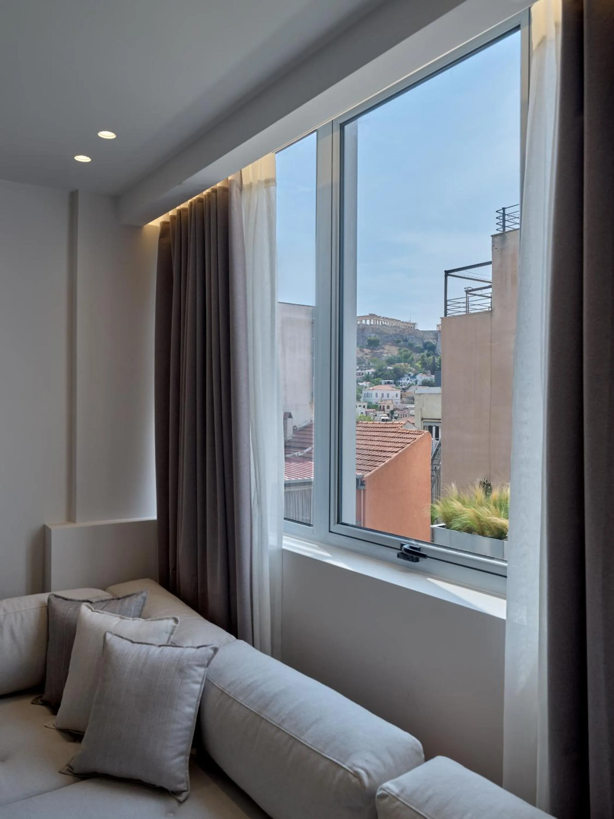 Landmark view, Bed in Haya Athens Loftie Suites