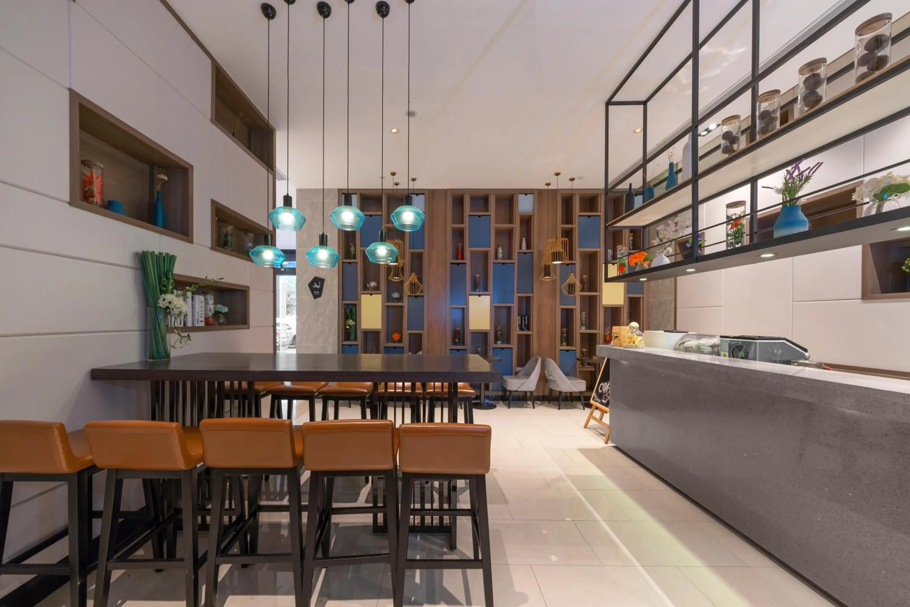 Lounge or bar in Echarm Hotel Haikou Zhongshan South Road East High Speed Railway Station