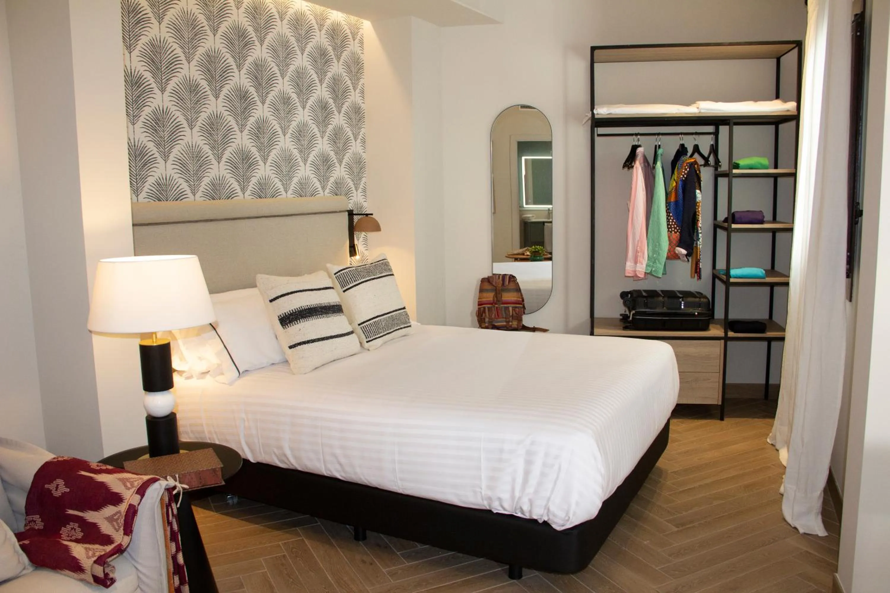 Bed in Puerta de la Ribera Suites