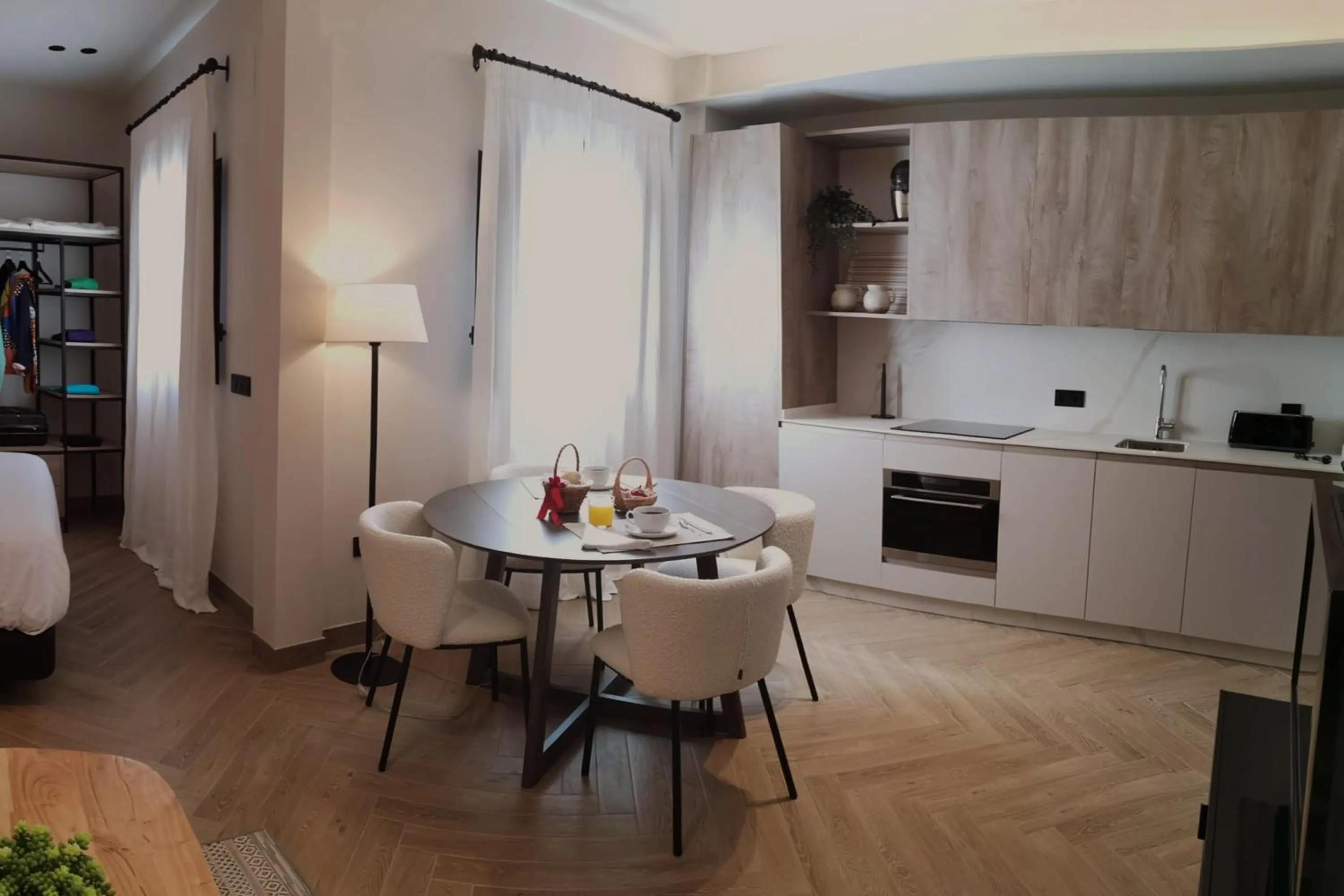 Kitchen or kitchenette in Puerta de la Ribera Suites