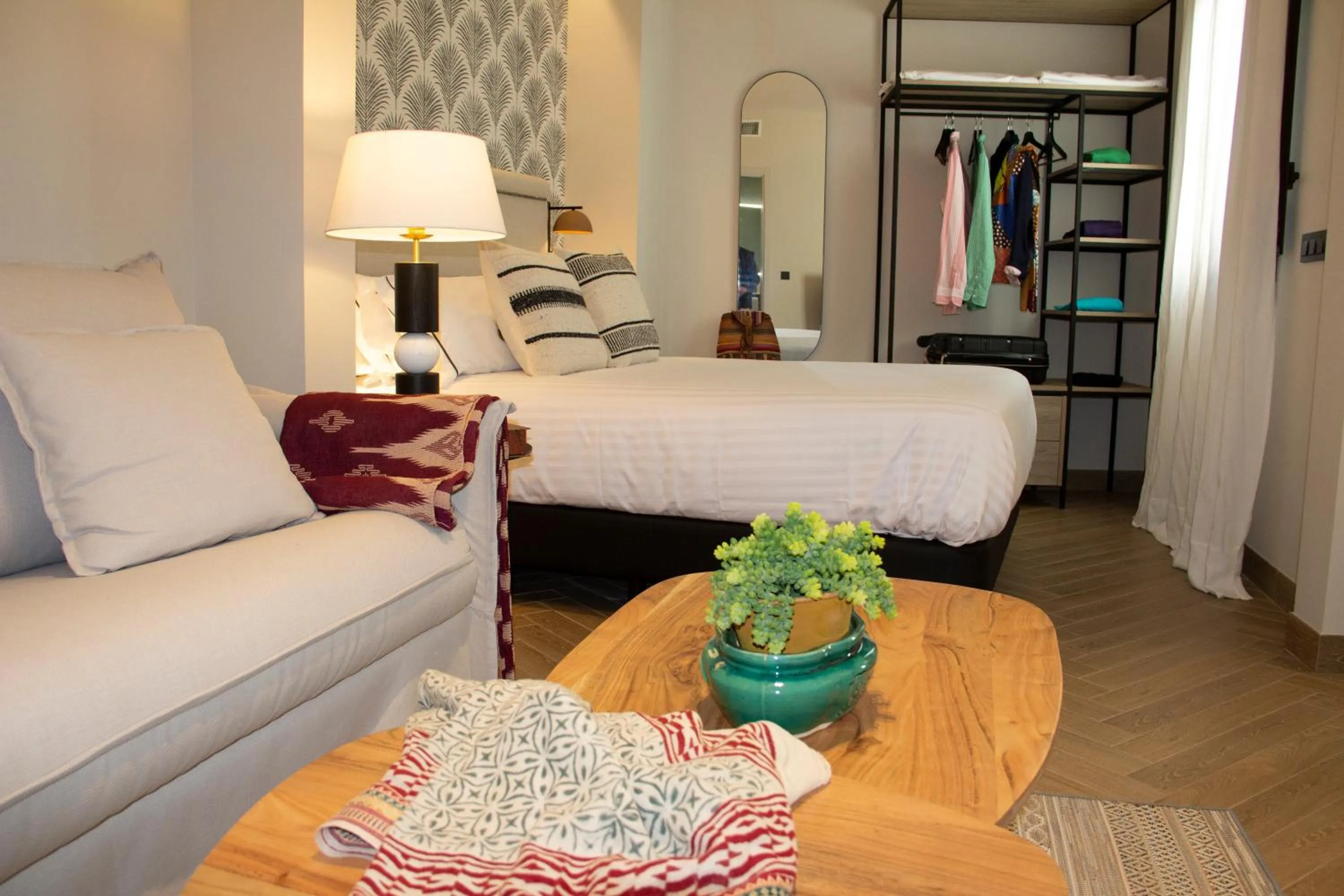 Bed in Puerta de la Ribera Suites