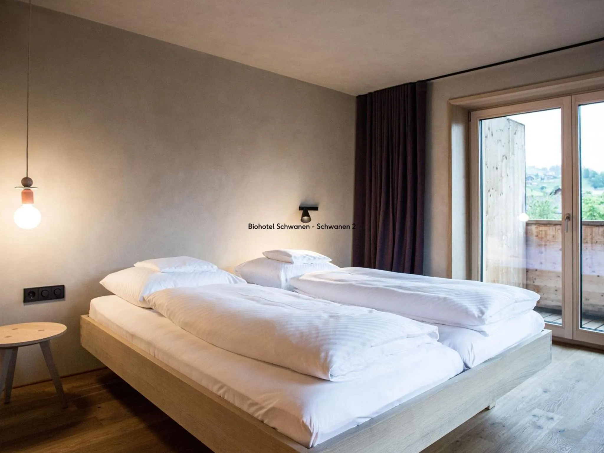 Bed in Biohotel Schwanen