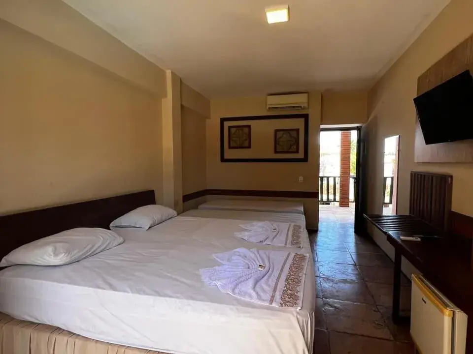 Standard Quadruple Room in Porto Futuro Hotel Standard Quadruple Room in Porto Futuro Hotel