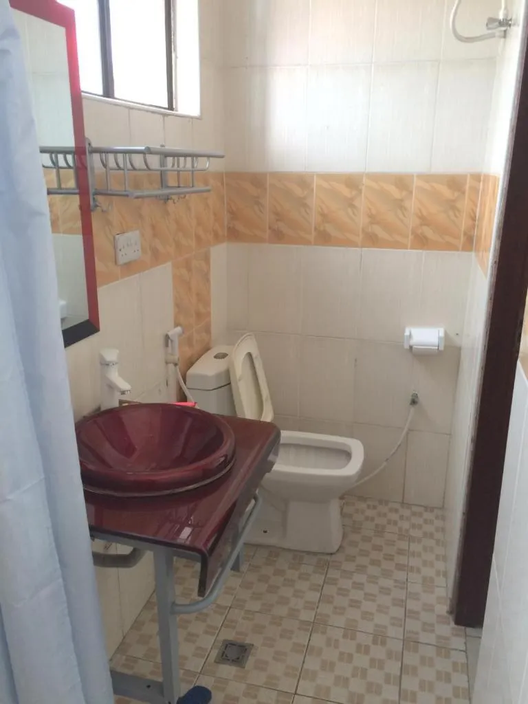 Bathroom in Best Point Hotel