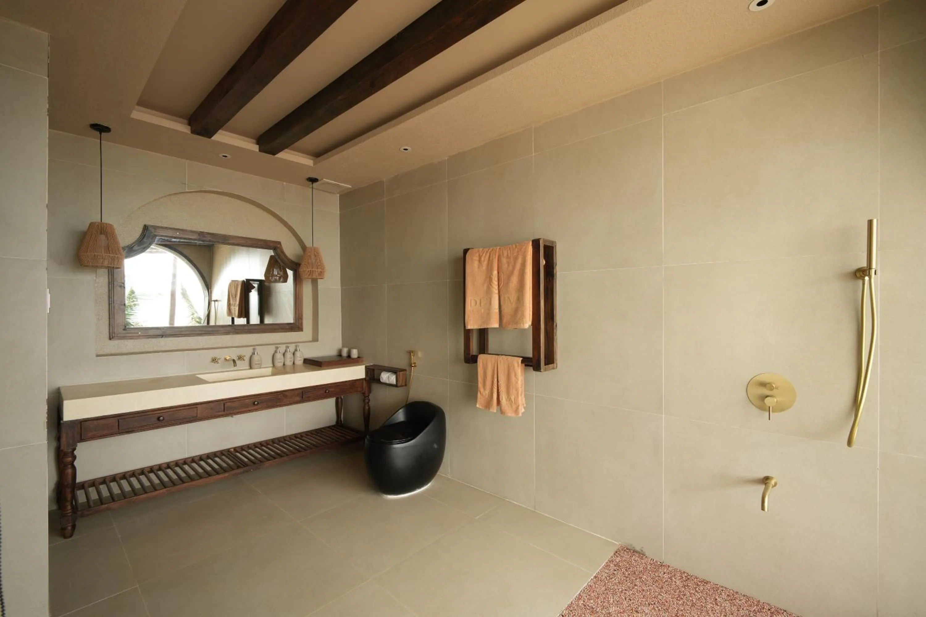 Shower in De' Tuva Resort Mui Ne