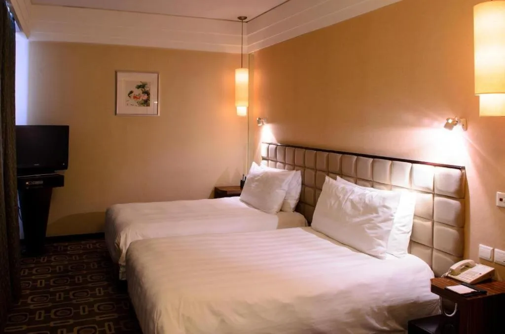 Bed in Sichuan Jinjiang Hotel