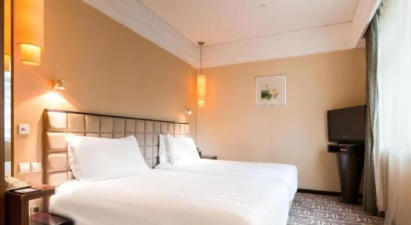 Bed in Sichuan Jinjiang Hotel