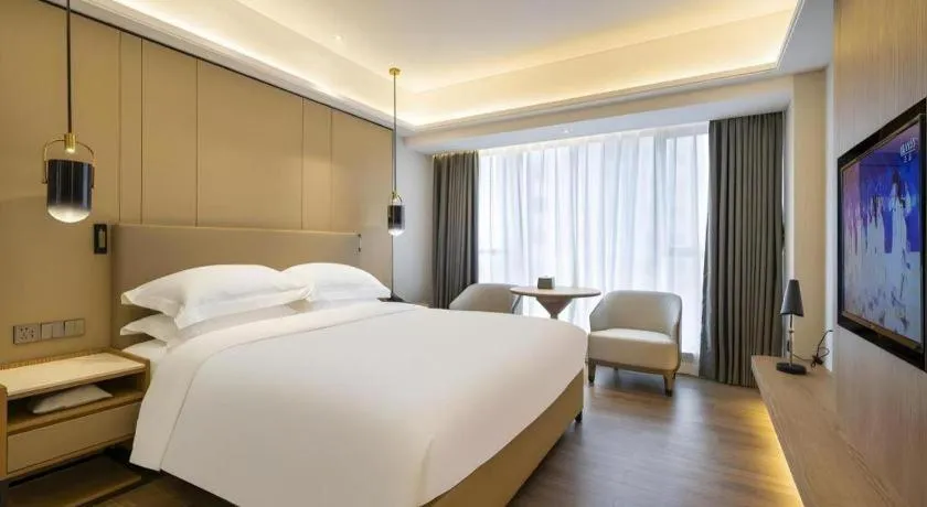 Bed in Shenzhen Hongfeng Hotel (Luohu Branch)