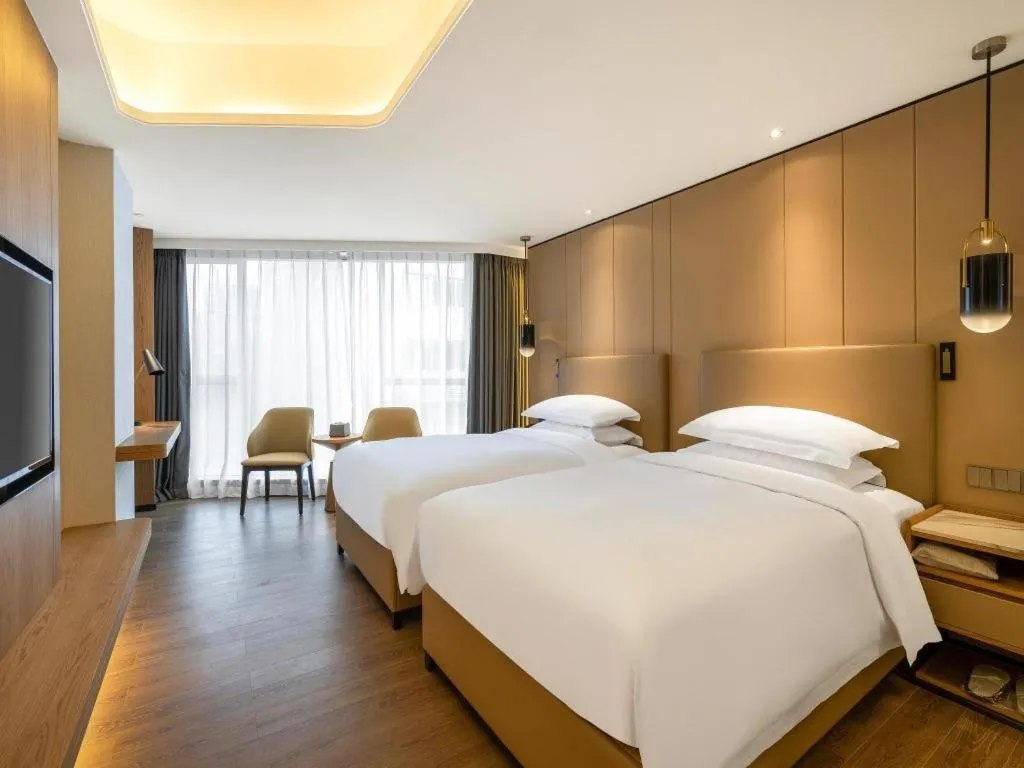 Bed in Shenzhen Hongfeng Hotel (Luohu Branch)