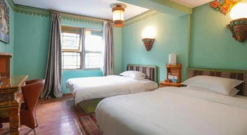 Bed in Tashitakge Hotel