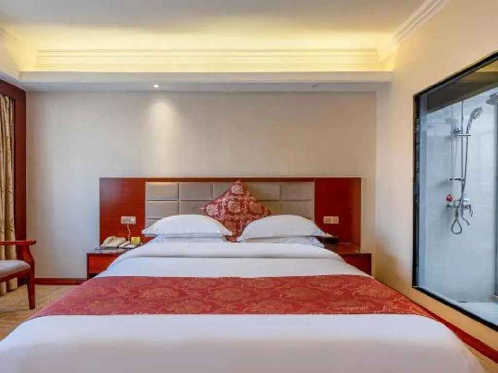 Bed in Overseas Chinese Hotel