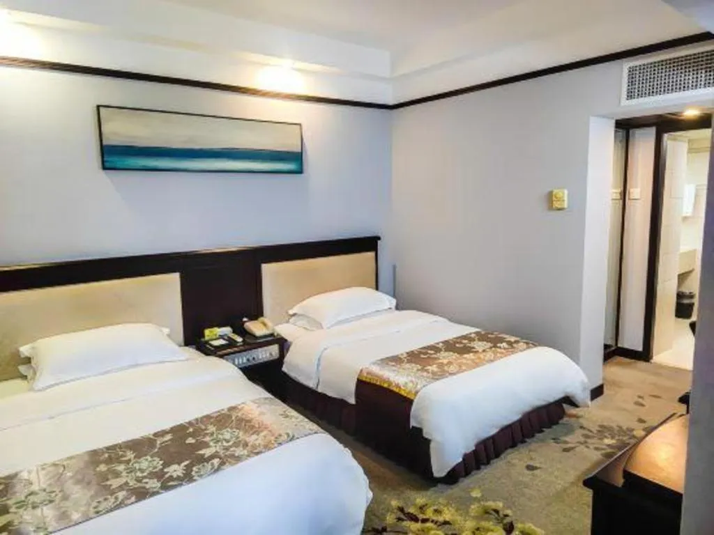 Bed in Overseas Chinese Hotel