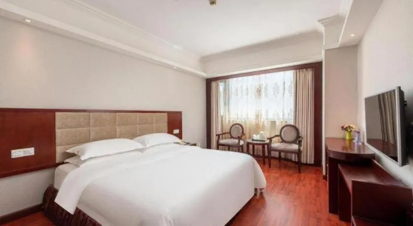 Bed in Overseas Chinese Hotel