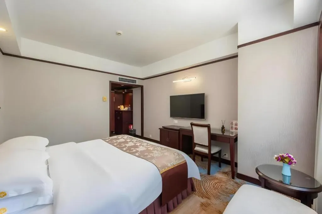 Bed in Overseas Chinese Hotel