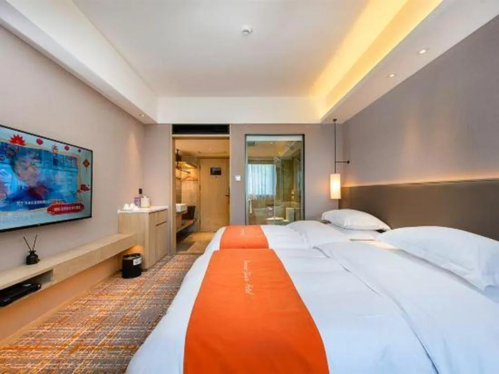 Bed in Overseas Chinese Hotel