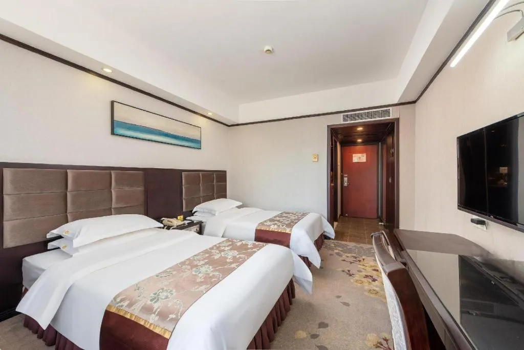 Bed in Overseas Chinese Hotel