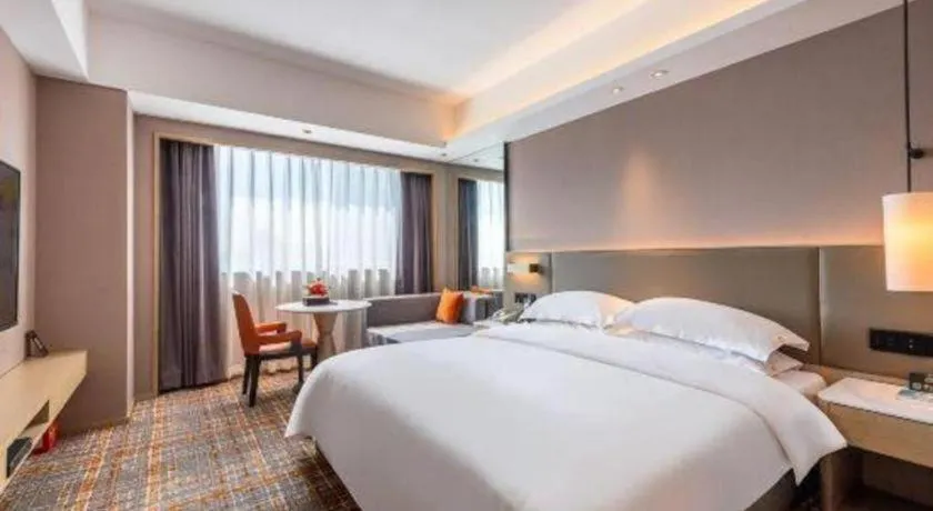 Bed in Overseas Chinese Hotel