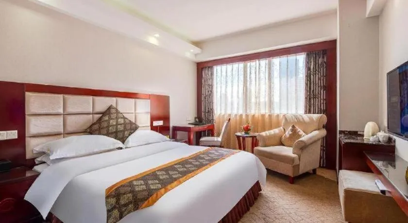 Bed in Overseas Chinese Hotel