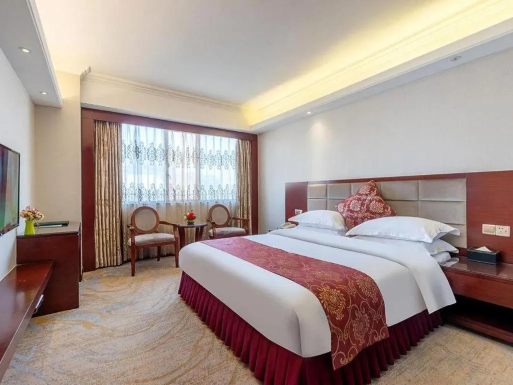 Bed in Overseas Chinese Hotel