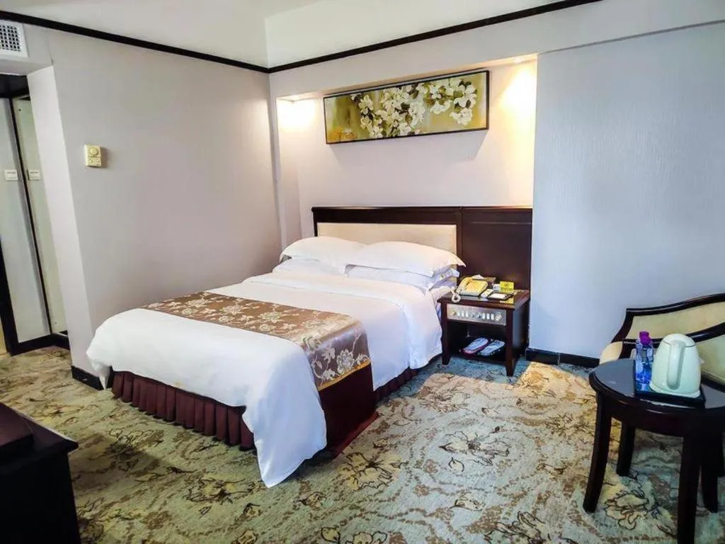 Bed in Overseas Chinese Hotel