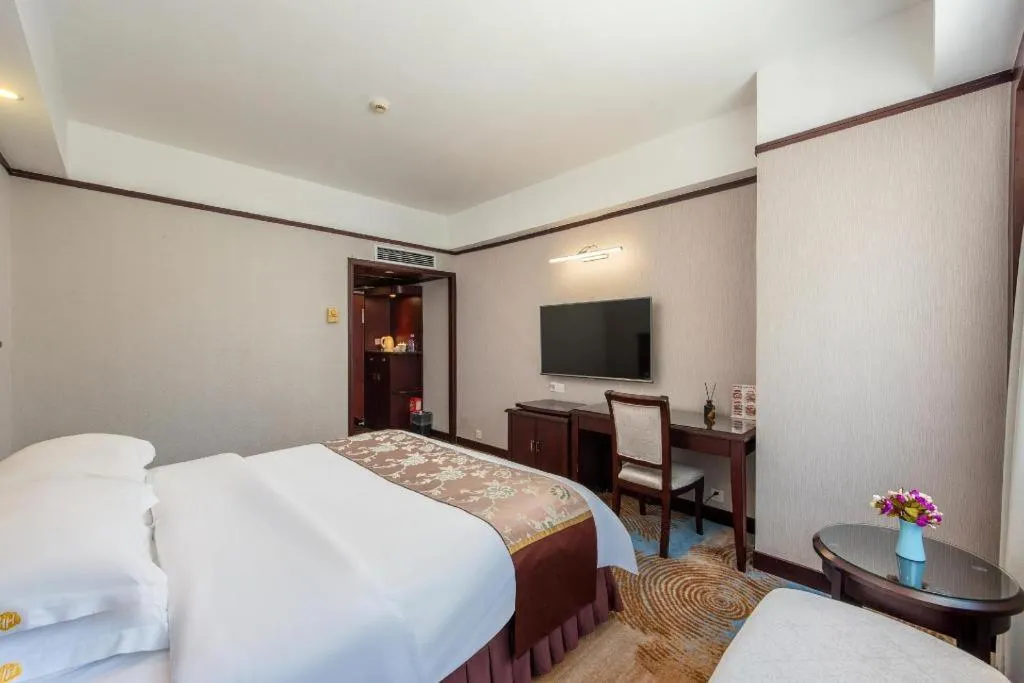 Bed in Overseas Chinese Hotel