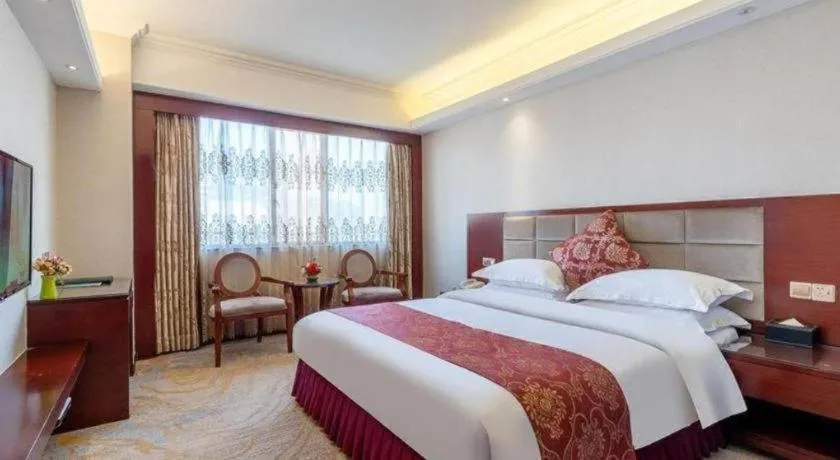 Bed in Overseas Chinese Hotel