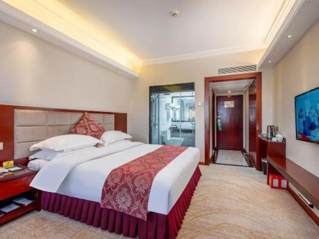 Bed in Overseas Chinese Hotel