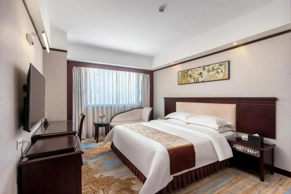 Bed in Overseas Chinese Hotel