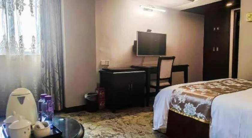 Bed in Overseas Chinese Hotel