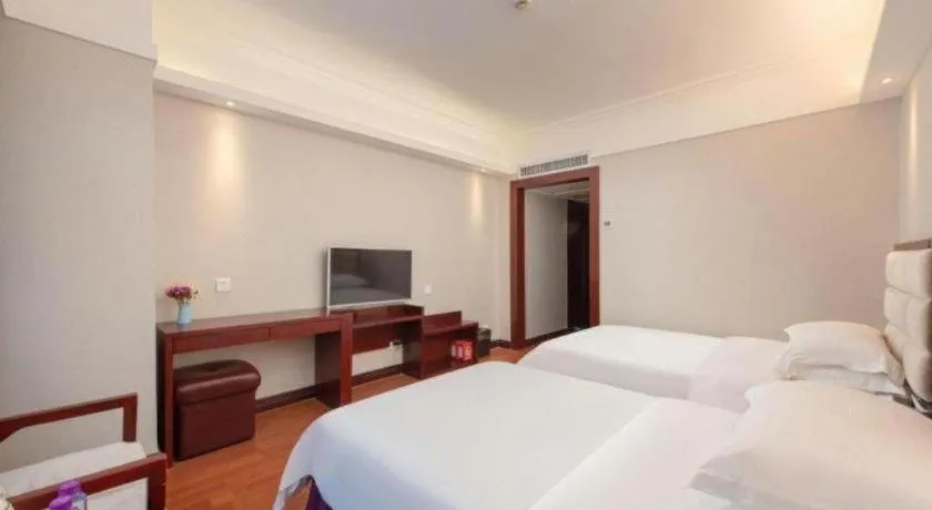 Bed in Overseas Chinese Hotel