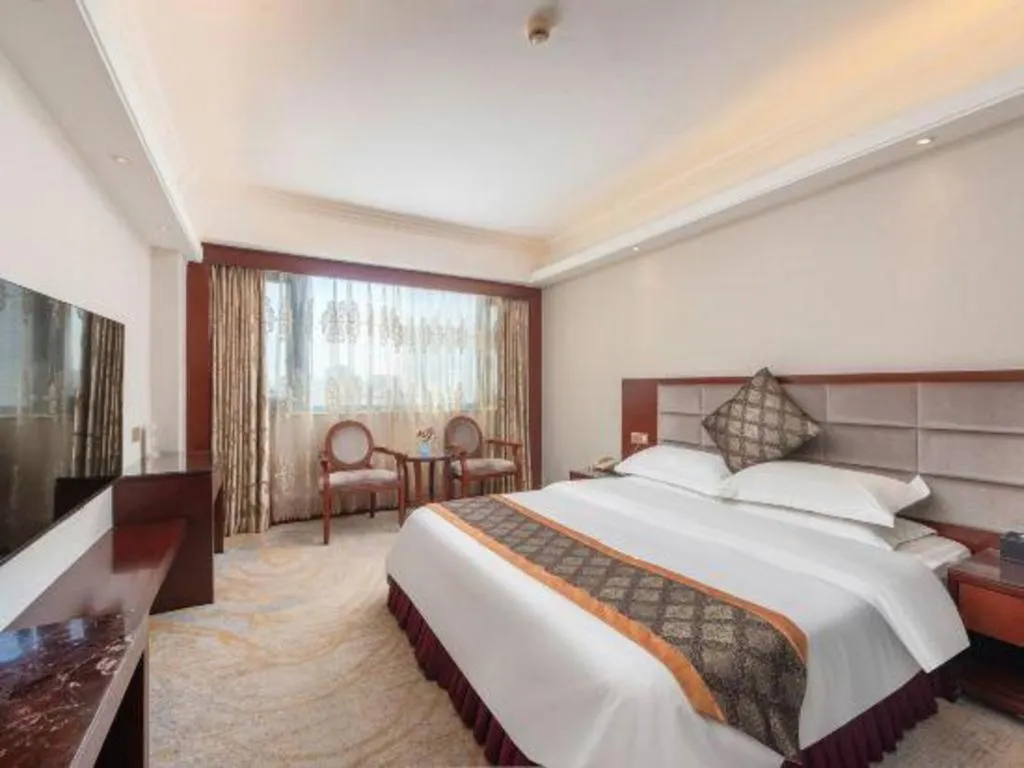 Bed in Overseas Chinese Hotel