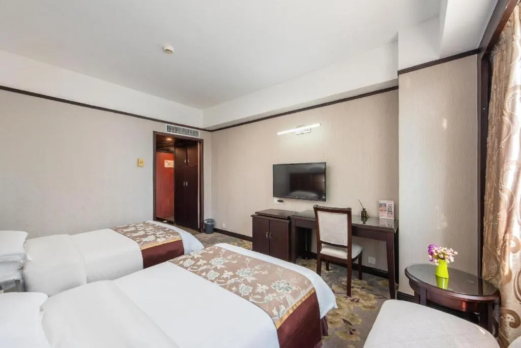 Bed in Overseas Chinese Hotel