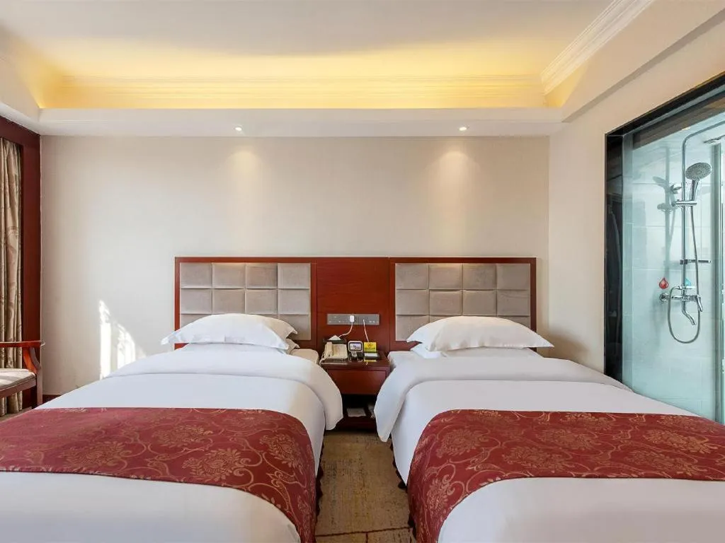 Bed in Overseas Chinese Hotel